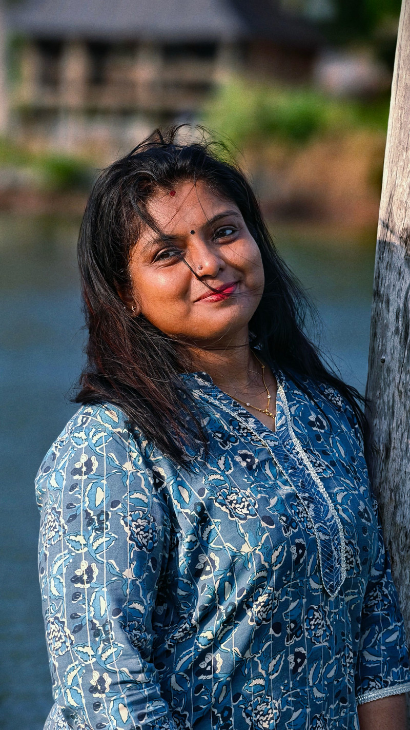 The indigo kurta's print and buttons, close.